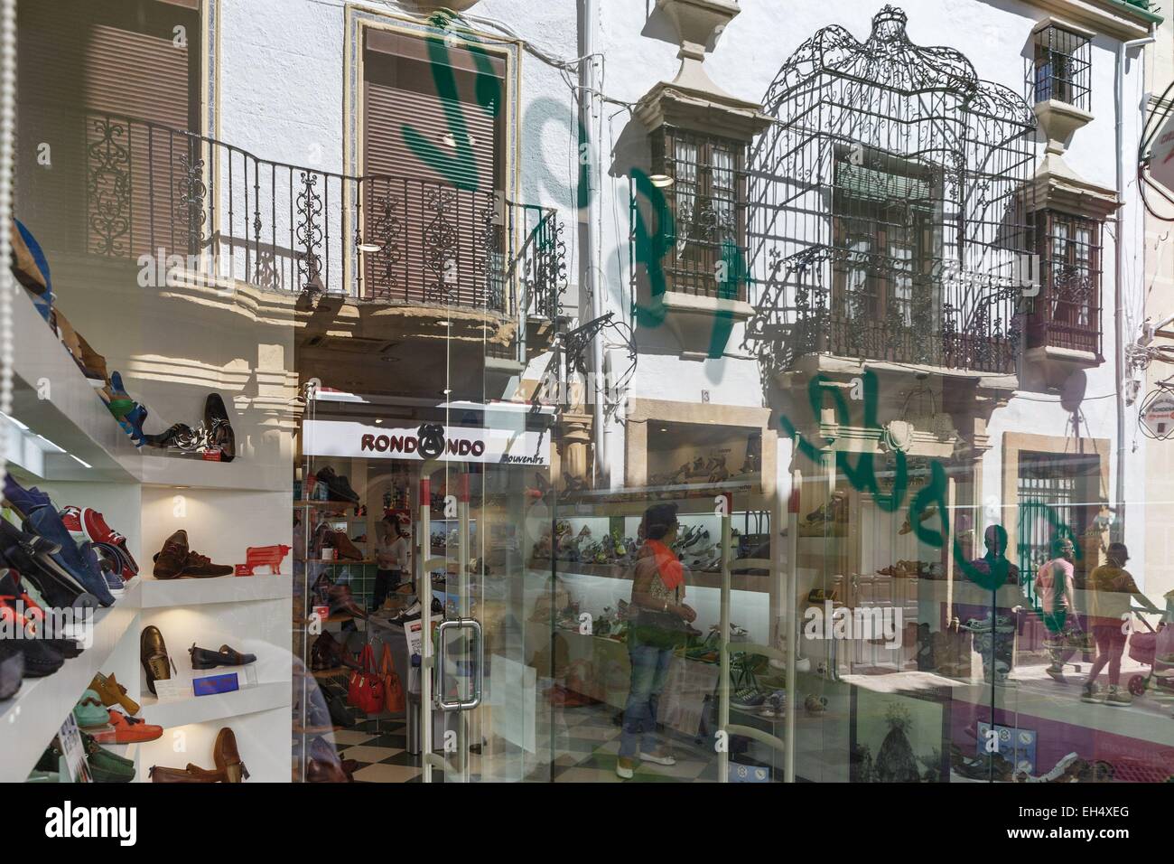 Spain, Andalusia, Malaga, Ronda, reflection of the street and buildings