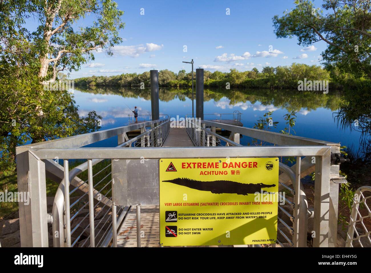 Australia, Northern Territory, Kakadu National Park, listed as World Heritage by UNESCO, sign indicating the presence of crocodiles on a Billabong jetty Stock Photo