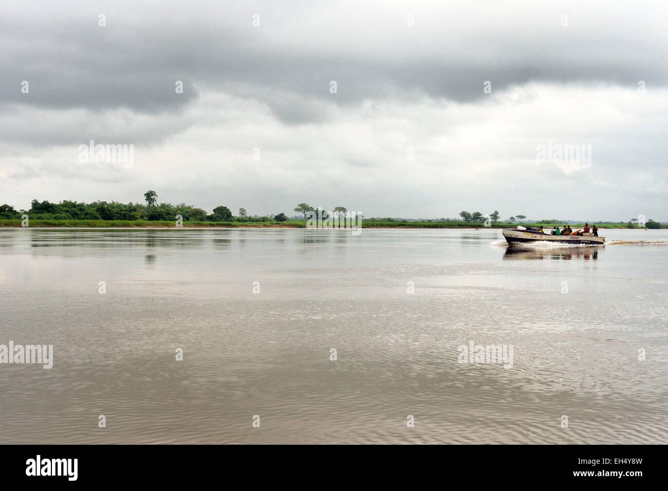 Gabon, Ogooue-Maritime Province, motor boat going up the Ogooue river Stock Photo