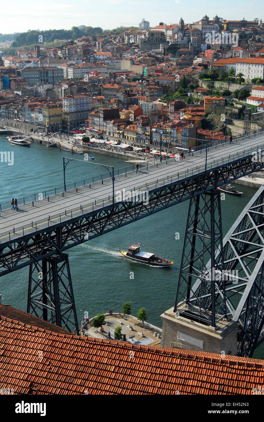 Portugal, North Region, Porto, historical center listed as World Heritage by UNESCO, the Eiffel style Dom Luis I bridge above the Douro river, a rabelos Stock Photo