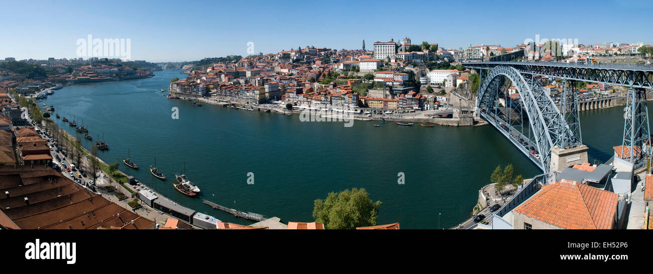 Portugal, North Region, Porto, historical center listed as World Heritage by UNESCO, Cais de Ribeira historic district, Vila Nova de Gaia, Barco Rabelo boats formerly used to transport port on the Douro River and Eiffel style Dom Luis I bridge Stock Photo