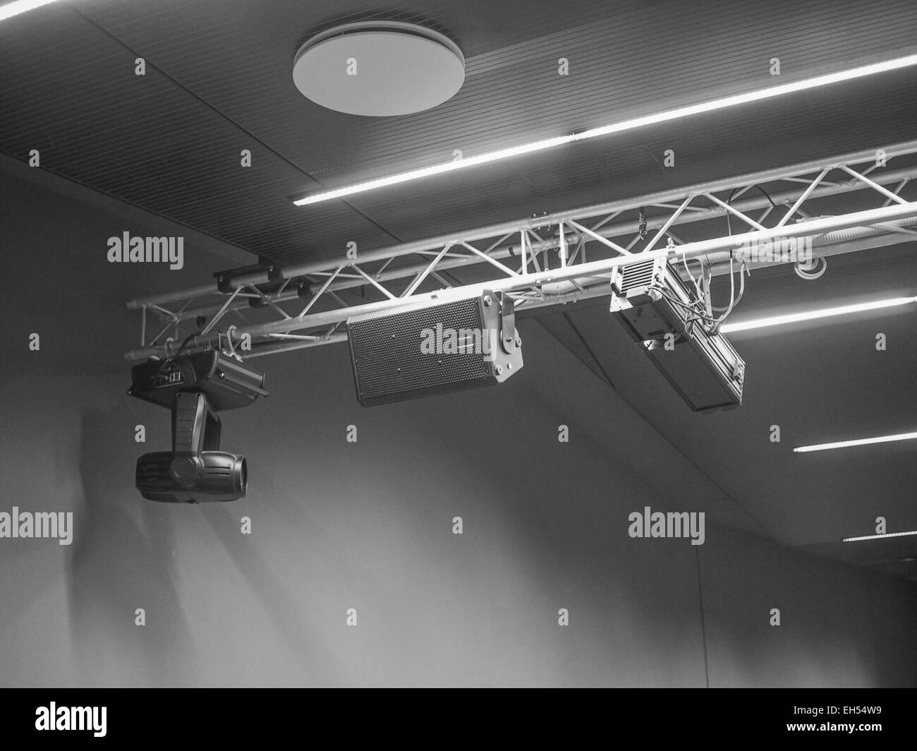 Stage lights and loudspeakers used in live gig concert in an auditorium ...