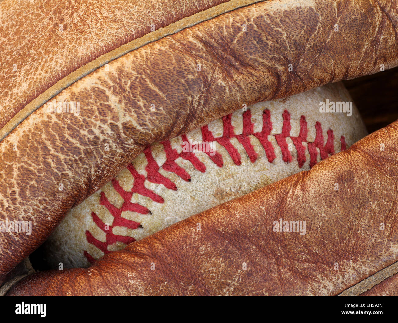 Baseball stitches showing through baseball glove Stock Photo Alamy