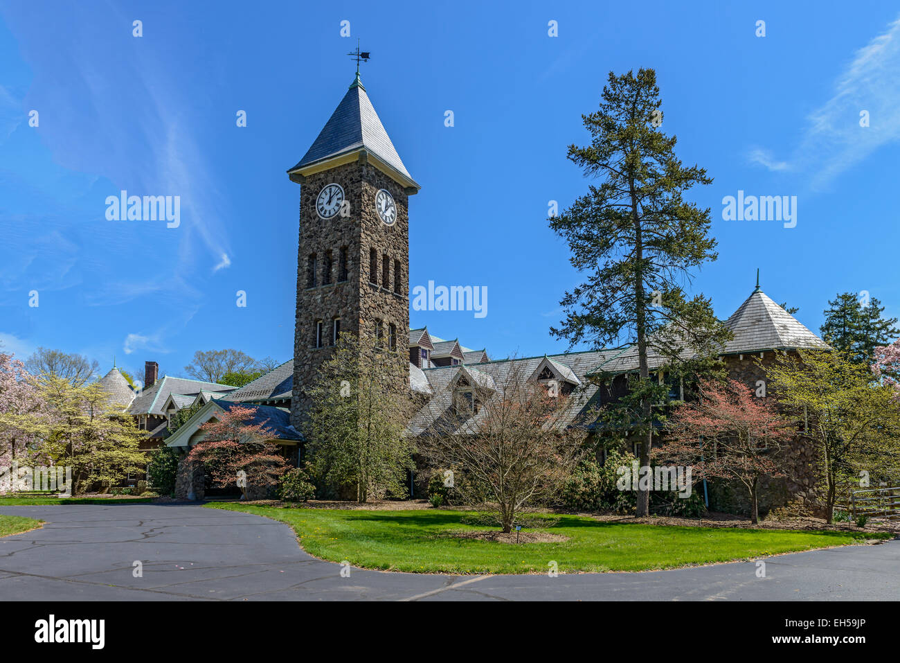 clock tower and rustic walls made from fieldstone Stock Photo Alamy