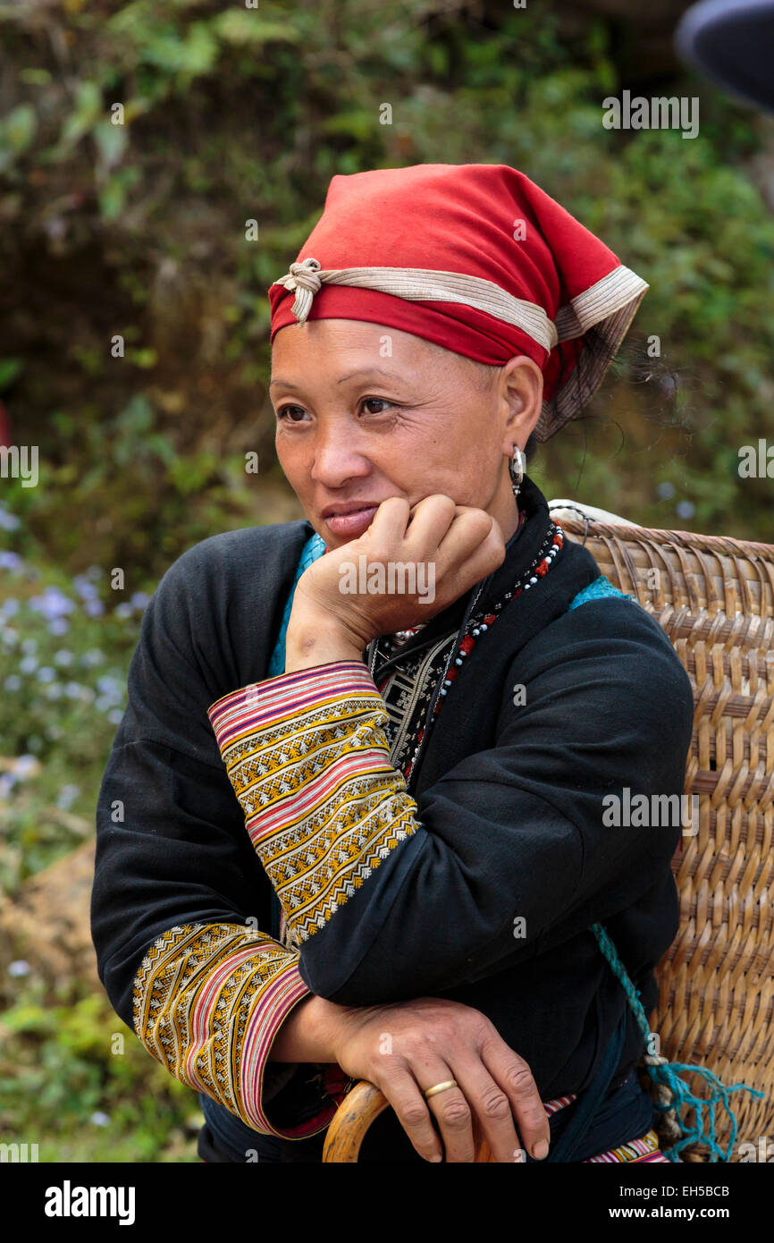 A hill-tribe girl of the Red Dao culture in Ta Phin village near Sapa, Vietnam, Asia. Stock Photo