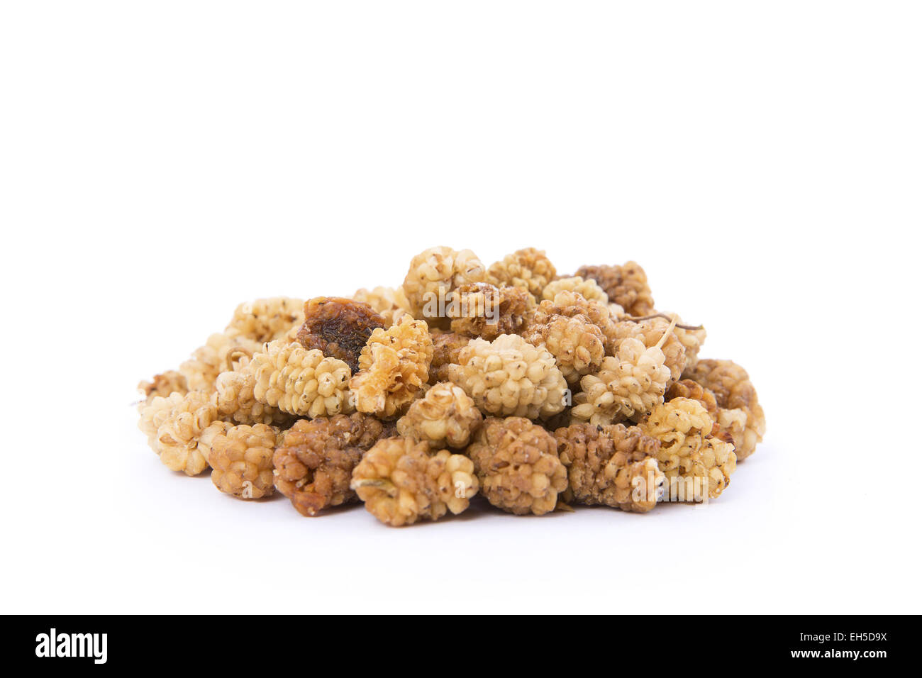 A pile / heap of raw organic mul berries on white background. Stock Photo