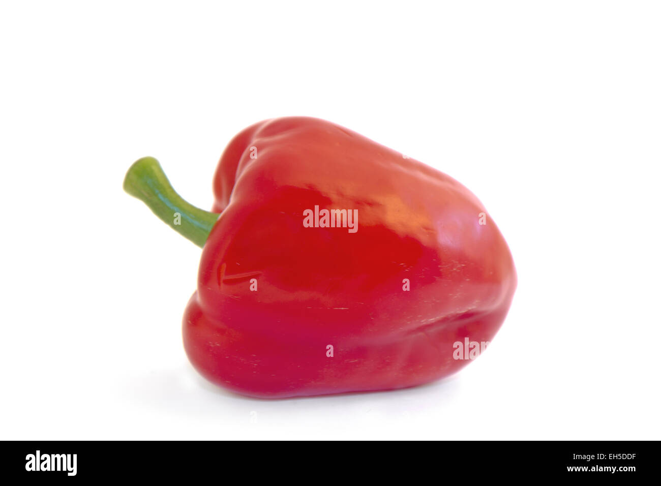 Organic and fresh red pepper on white background. Stock Photo