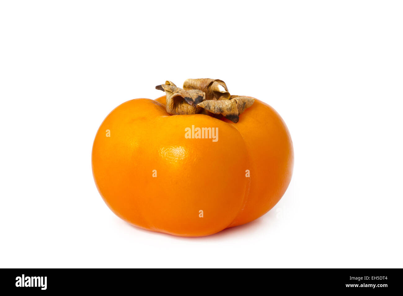 Side view of a sharon / persimmon white background. Stock Photo