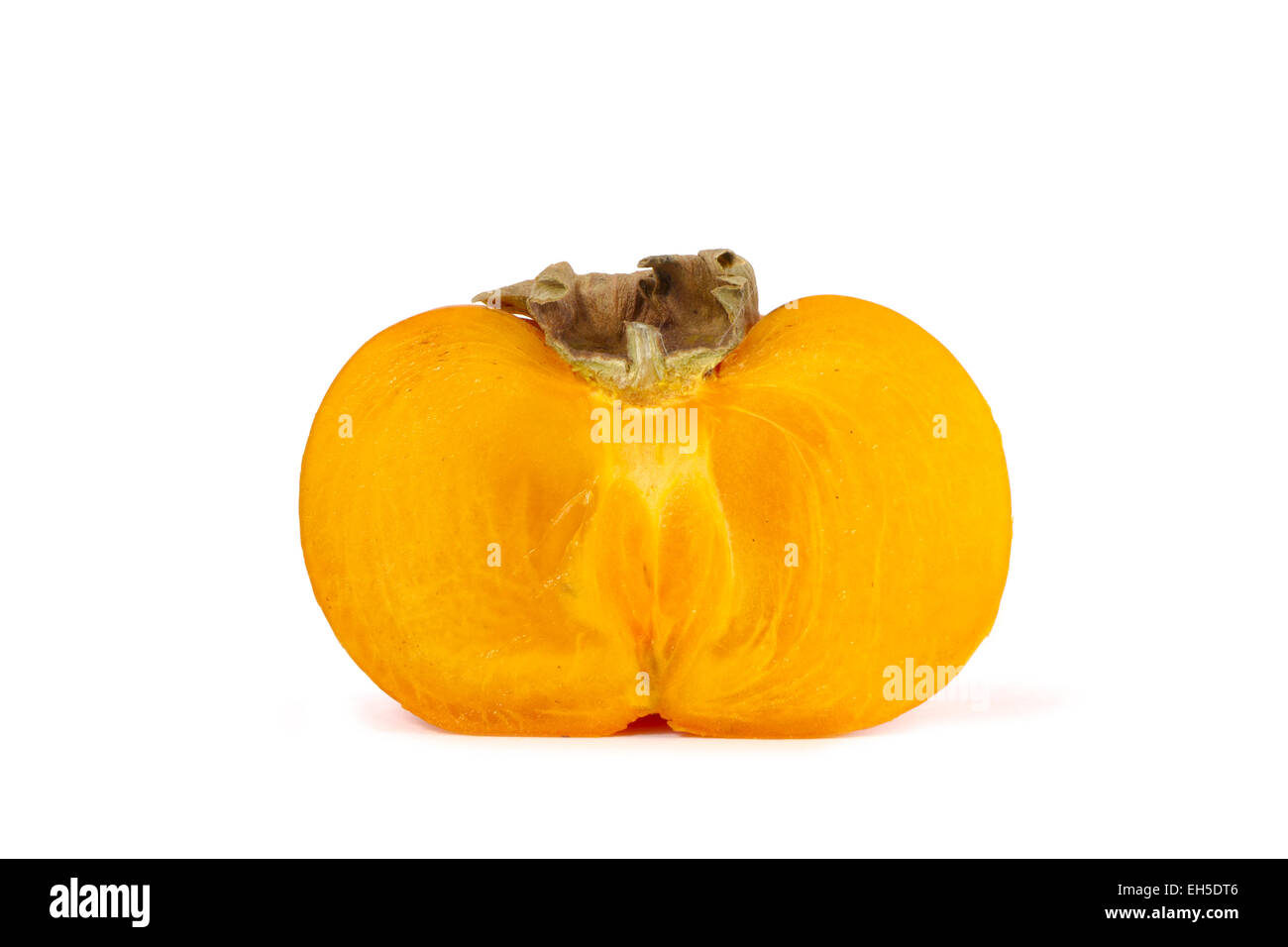 Side view of a sharon / persimmon white background. Stock Photo