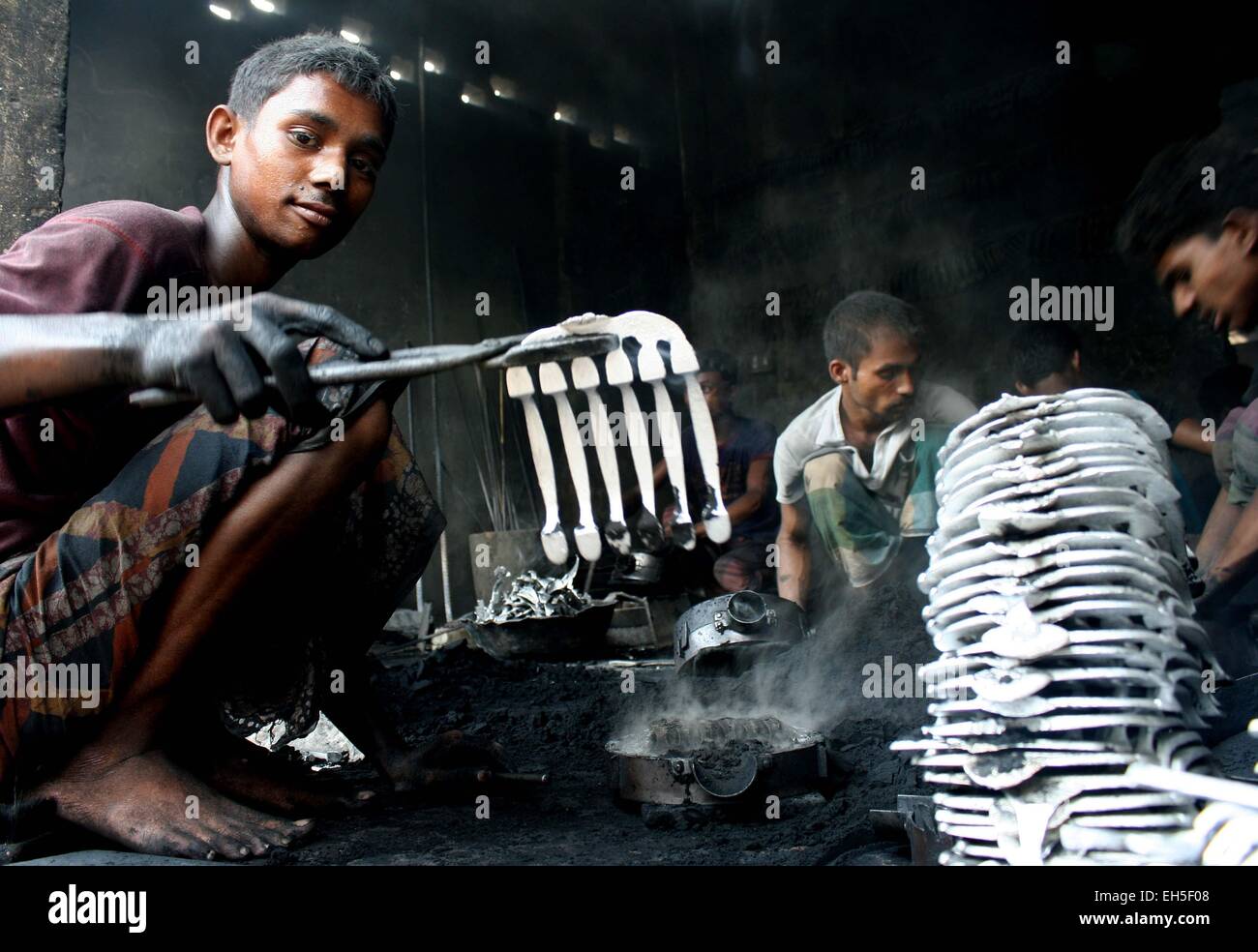 Child Workers at a steel recycling and re-rolling mill in Dhaka Stock ...