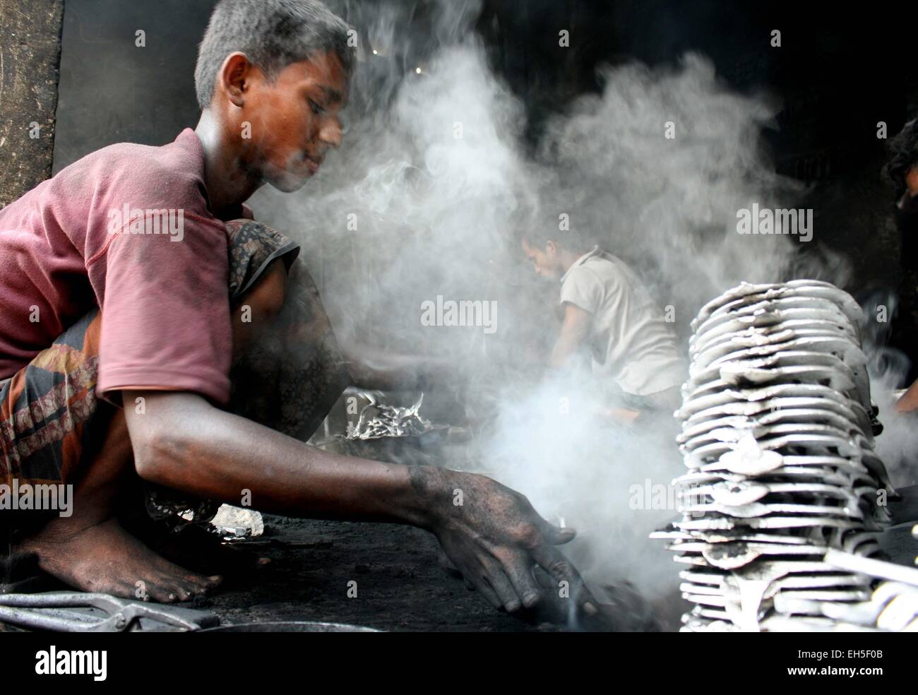 Child Workers at a steel recycling and re-rolling mill in Dhaka Stock ...