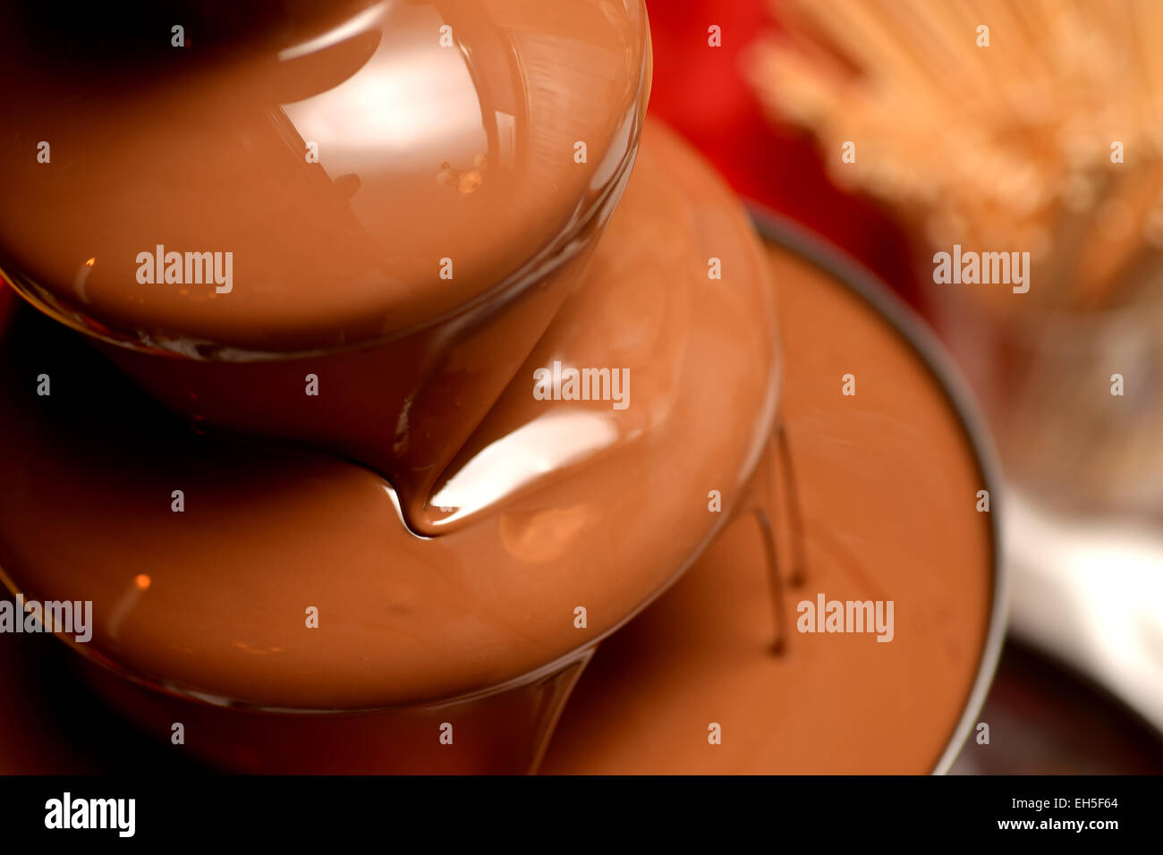 Chocolate fountain placed on a table in wedding day Stock Photo
