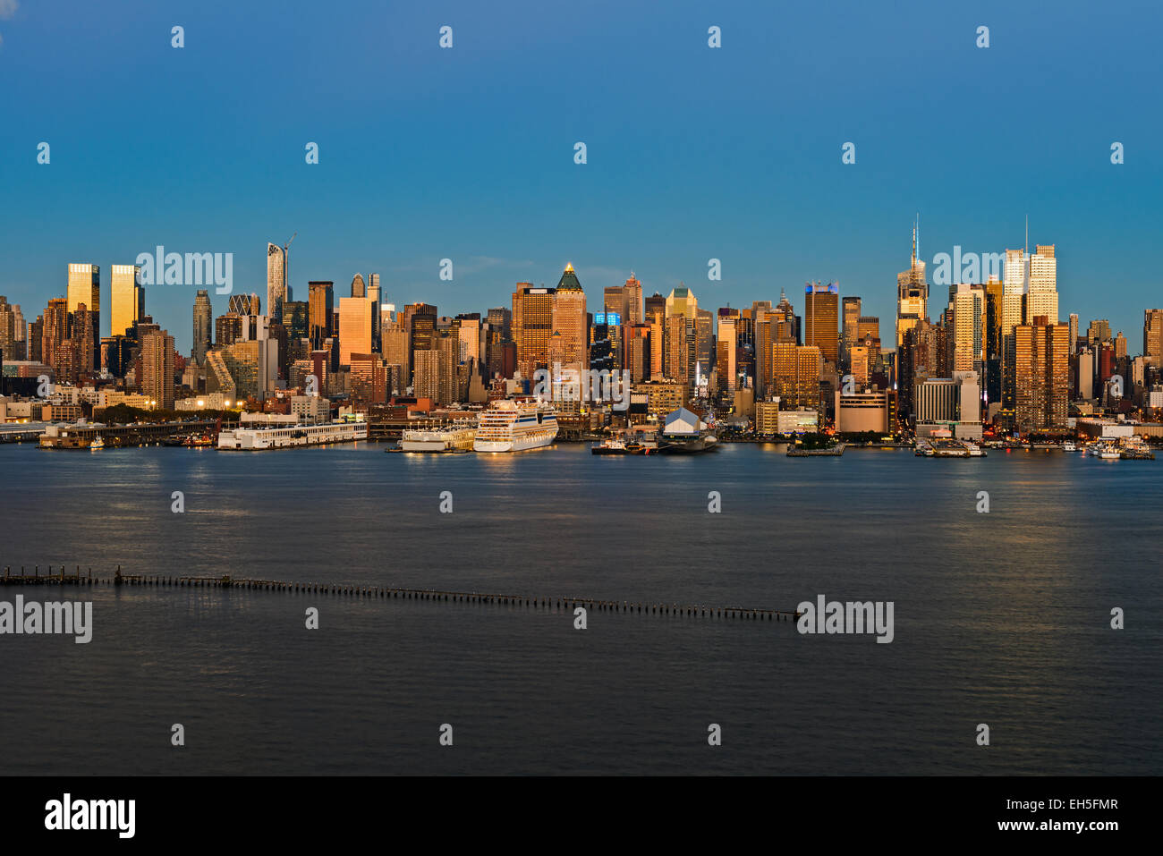 New York City midtown skyline at dusk over Hudson river Stock Photo - Alamy
