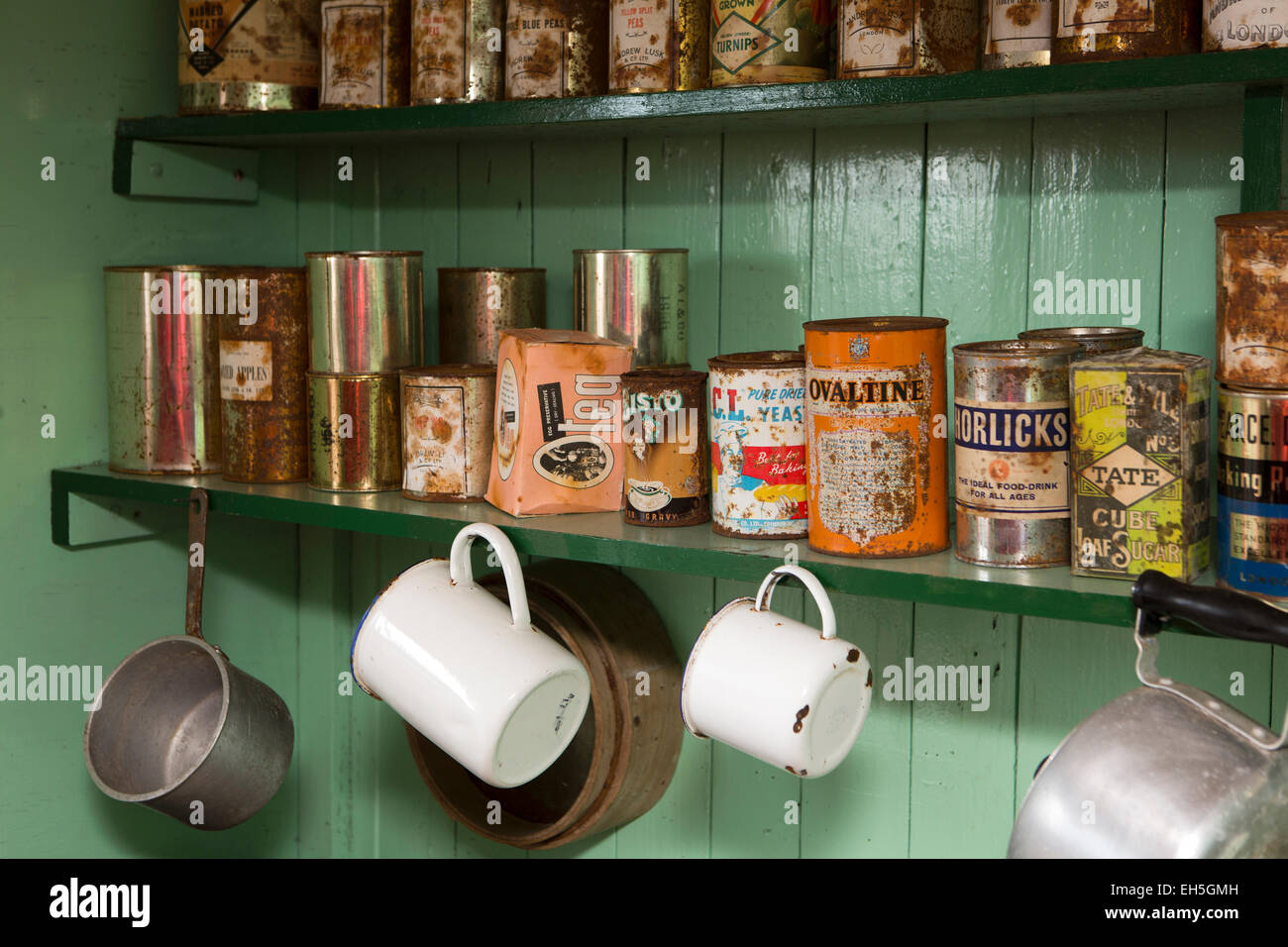 Antarctica, Port Lockroy British base museum, kitchen shelf containing 1950s tinned food Stock Photo