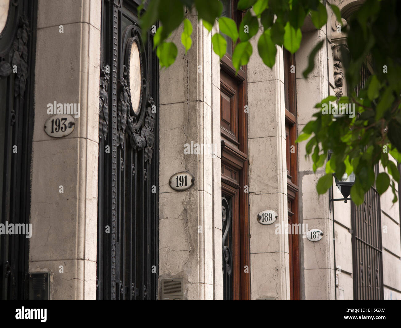 Argentina, Buenos Aires, Almagro, Quintino Bocayuva, house numbers on doorways Stock Photo