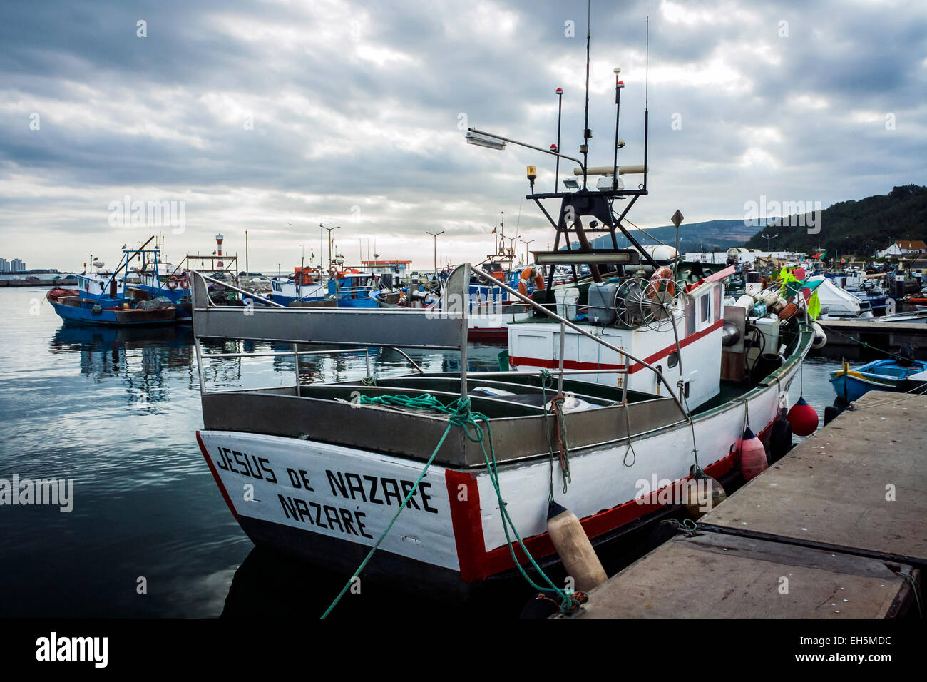 Fishing boats moored at the dock Stock Photo - Alamy
