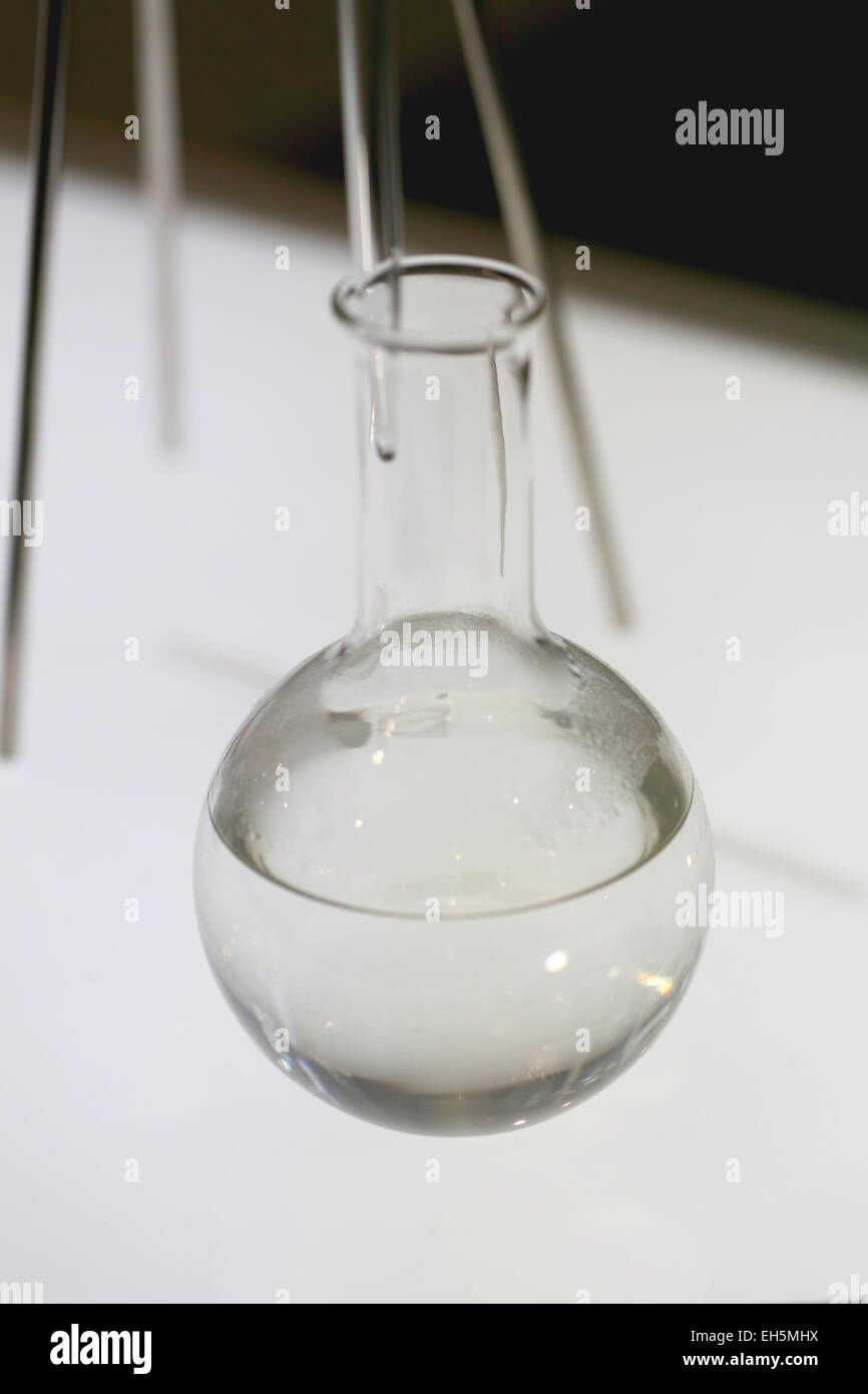 Focus on Glass bottles used in chemistry experiments. Stock Photo