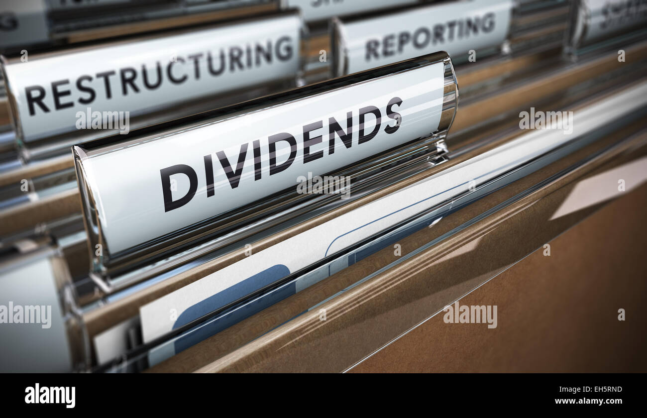 File tab with focus on the word dividends. Conceptual image for illustration of company restructuring plan and dividend. Stock Photo