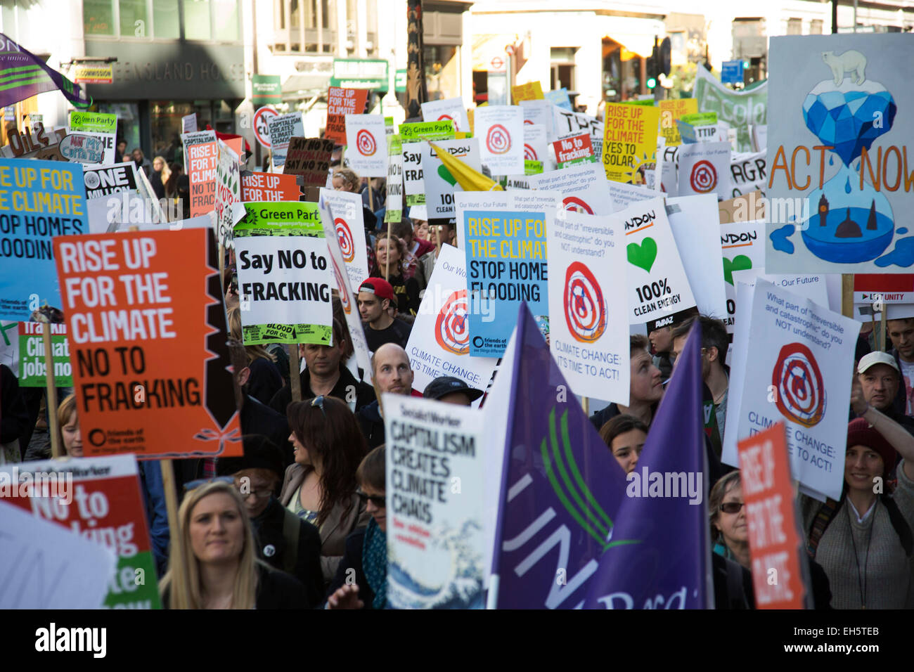 London, UK. Saturday 7th March 2015. Time to Act. Campaign against Climate Change demonstration. Demonstrators gathered in their tens of thousands to protest against all kinds of environmental issues such as fracking, clean air, alternative energies and generally all business which puts profit before the environment. Credit:  Michael Kemp/Alamy Live News Stock Photo