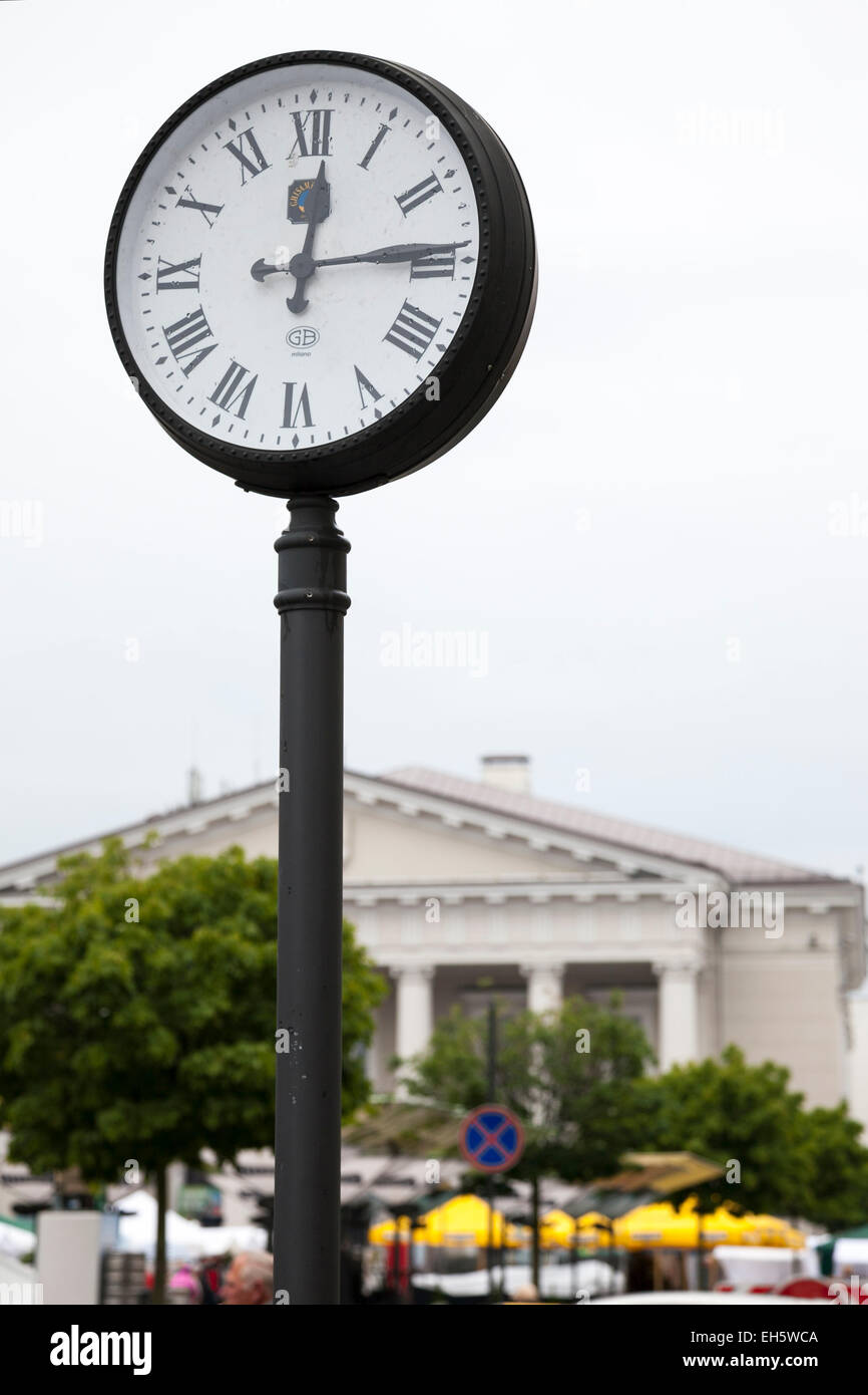 A clock outside the Town Hall in Vilnius, Lithuania Stock Photo