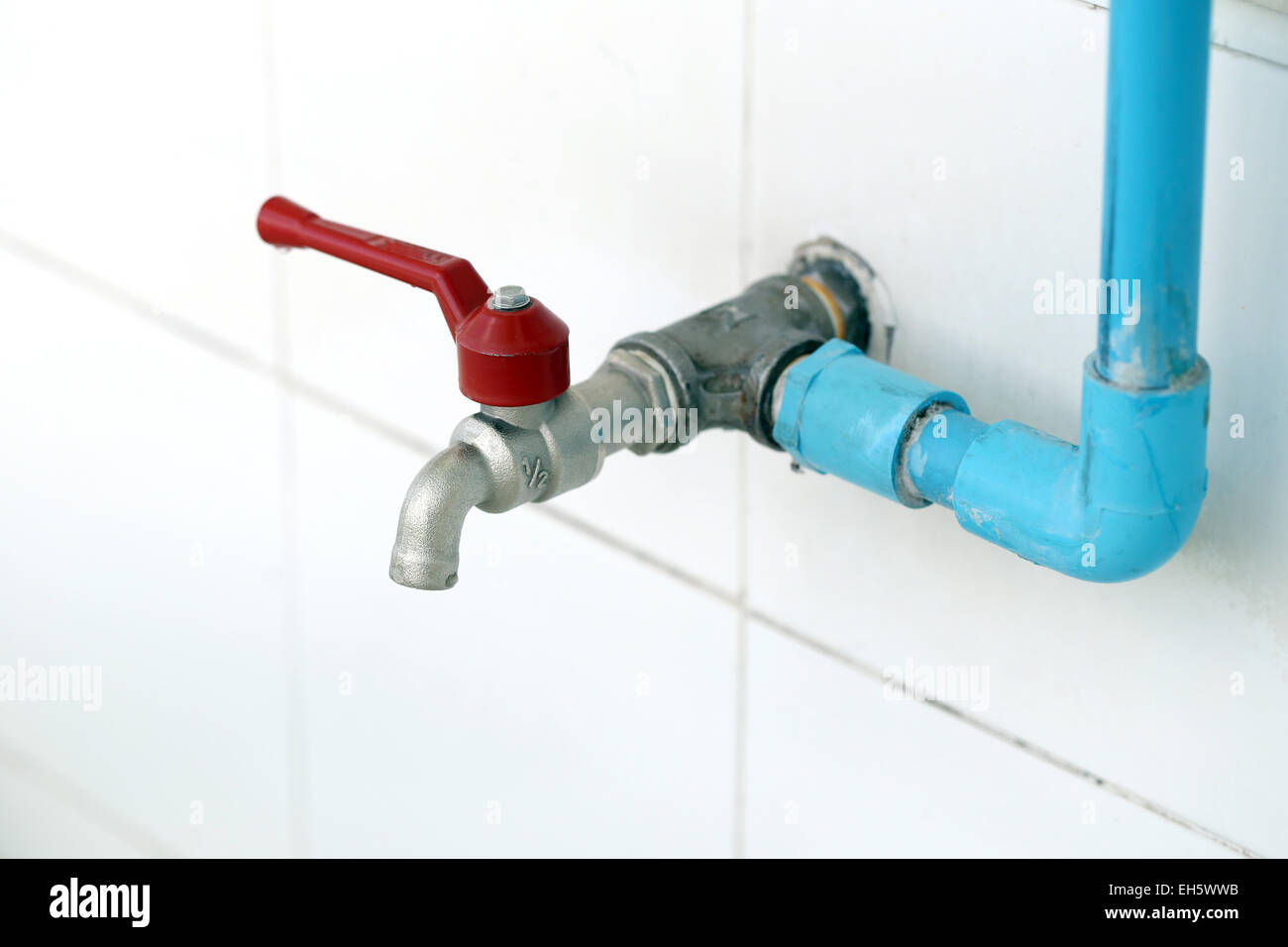 Focus on Faucet of sink in the house. Stock Photo