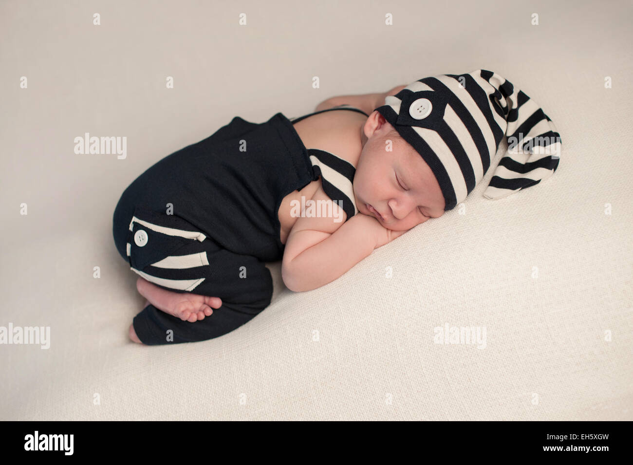 Baby boy wearing blue pajamas hires stock photography and images Alamy