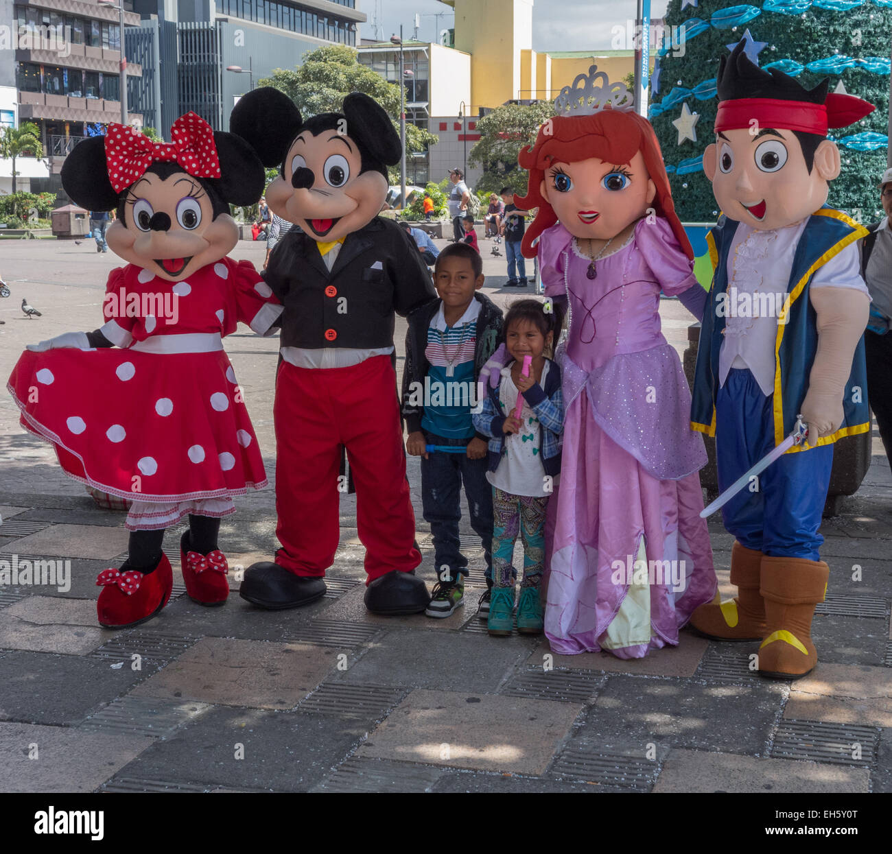 Kids posing with Disney characters in San Jose,Costa Rica Stock Photo