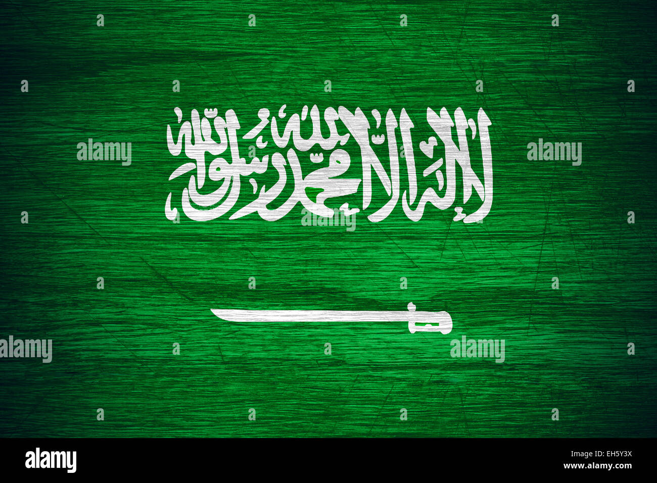 Saudi Arabia flag or banner on wooden texture Stock Photo