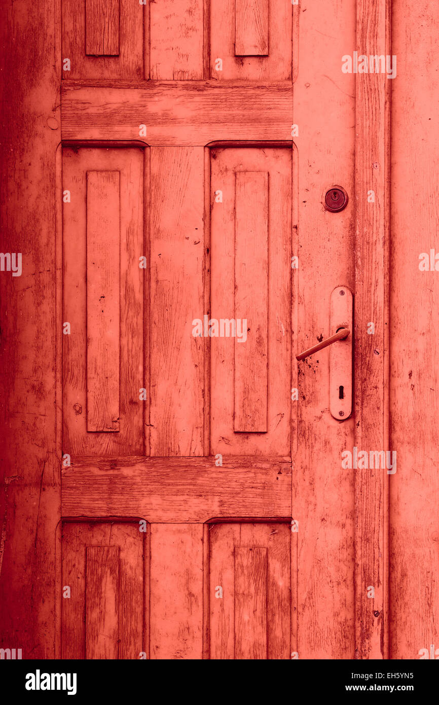 fragment of red old closed door Stock Photo