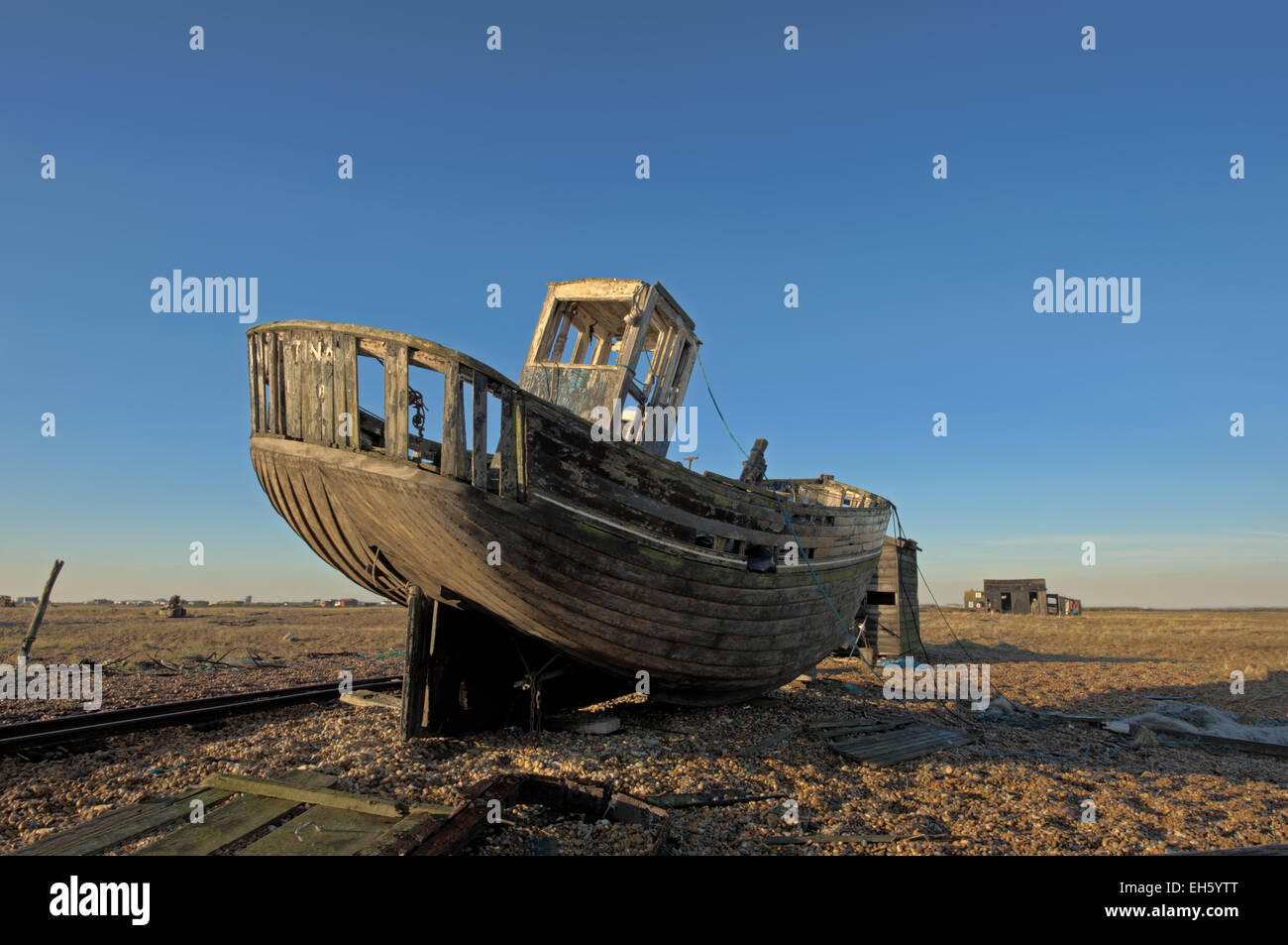 hdr image of an abondoned boat on a shingle beach using a combination of 7 images Stock Photo