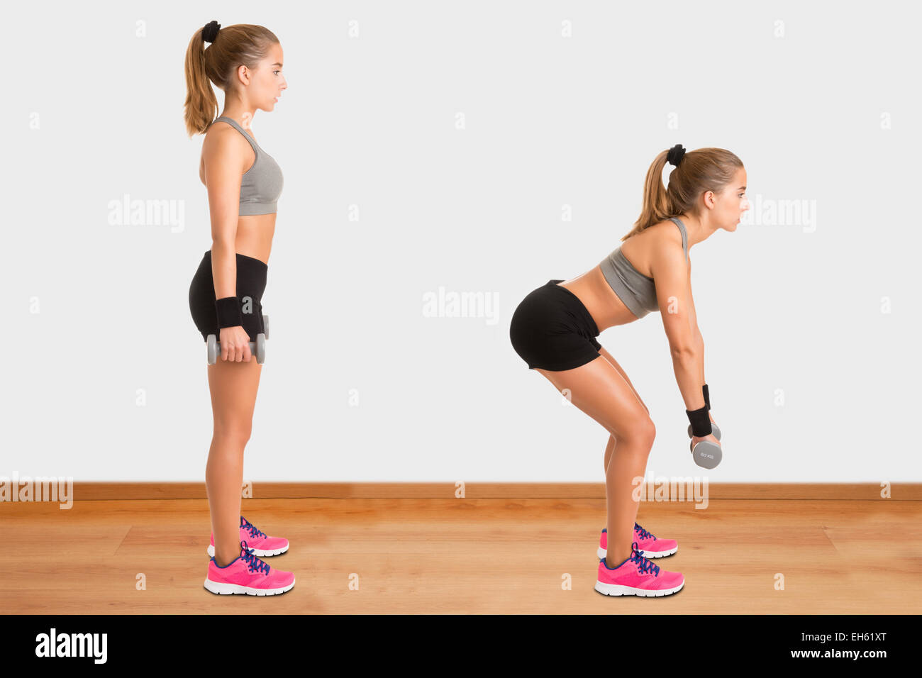 Female doing dumbbell deadlifts in a gym Stock Photo
