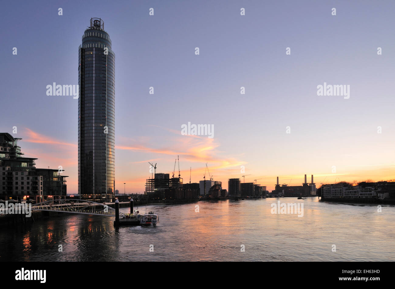 River Thames London UK from Vauxhall Bridge at dusk, with St Georges Wharf Tower in foreground Stock Photo