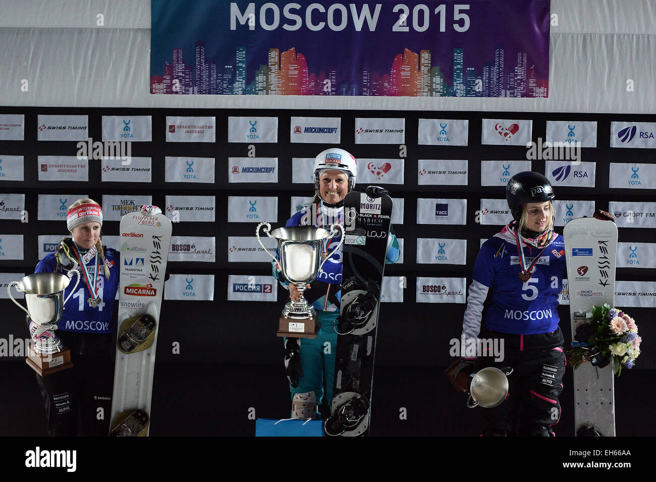 Moscow, Russia. 7th Mar, 2015. Silver medalist Julie Zogg of Switzerland (L), gold medalist Claudia Riegler of Austria (C) and Bronze medalist Patrizia Kummer of Switzerland pose during the awarding ceremony after the ladies parallel slalom of FIS Snowboard World Cup in Moscow, capital of Russia, March 7, 2015. © Pavel Bednyakov/Xinhua/Alamy Live News Stock Photo