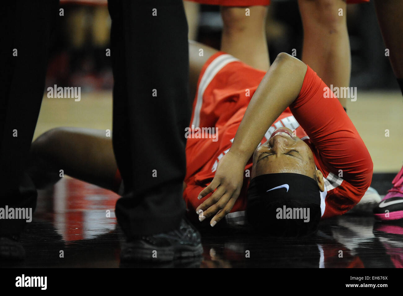 Hoffman Estates, IL, USA. 7th Mar, 2015. Ohio State Buckeyes guard Ameryst Alston (14) on the ground in pain after a play in the first half during the 2015 Big Ten Women's Basketball Tournament game between the Iowa Hawkeyes and the Ohio State Buckeyes at the Sears Centre in Hoffman Estates, IL. Patrick Gorski/CSM/Alamy Live News Stock Photo