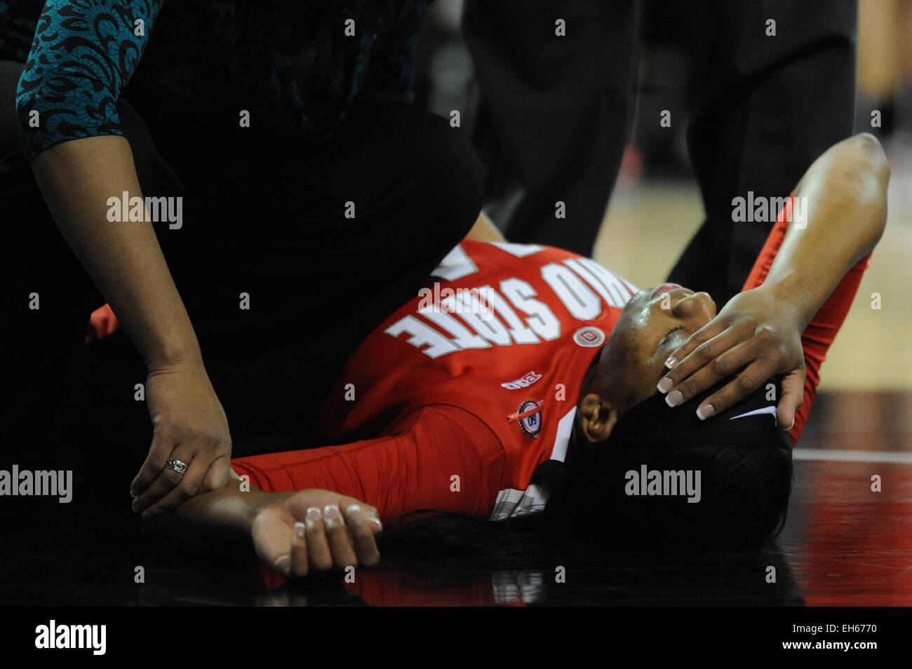 Hoffman Estates, IL, USA. 7th Mar, 2015. Ohio State Buckeyes guard Ameryst Alston (14) lays on the court after an injury in the first half during the 2015 Big Ten Women's Basketball Tournament game between the Iowa Hawkeyes and the Ohio State Buckeyes at the Sears Centre in Hoffman Estates, IL. Patrick Gorski/CSM/Alamy Live News Stock Photo