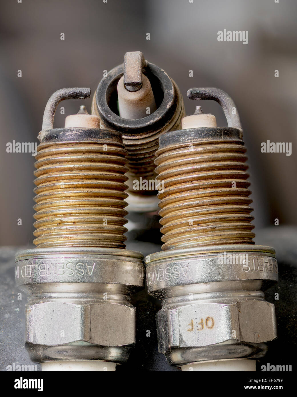 Three Spark plugs close up Stock Photo