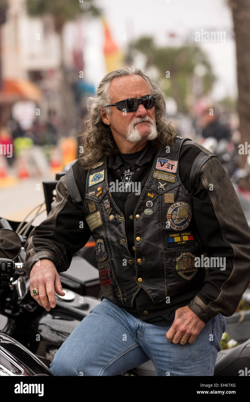 A bearded biker on Main Street during the 74th Annual Daytona Bike Week ...