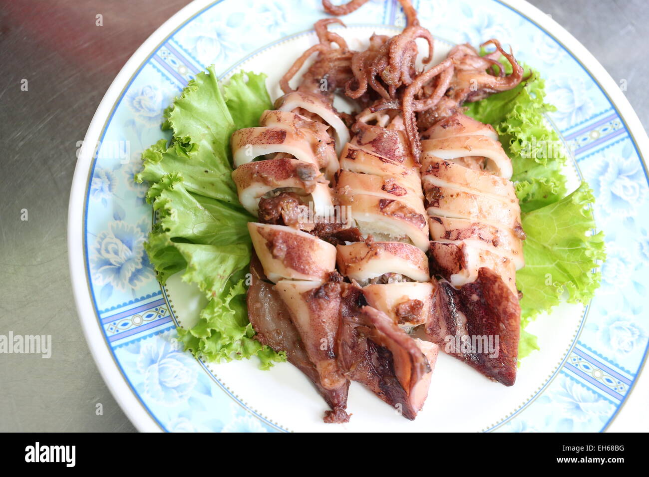 Deep Fried Squid Garlic and Pepper on dish Stock Photo - Alamy