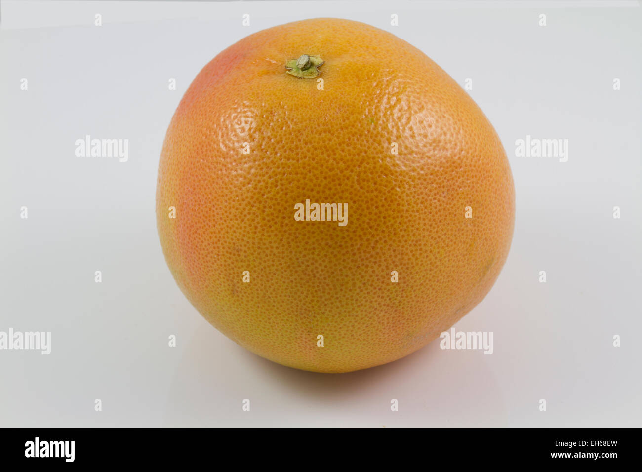 Yellow and pink grapefruit ready to be eaten Stock Photo Alamy