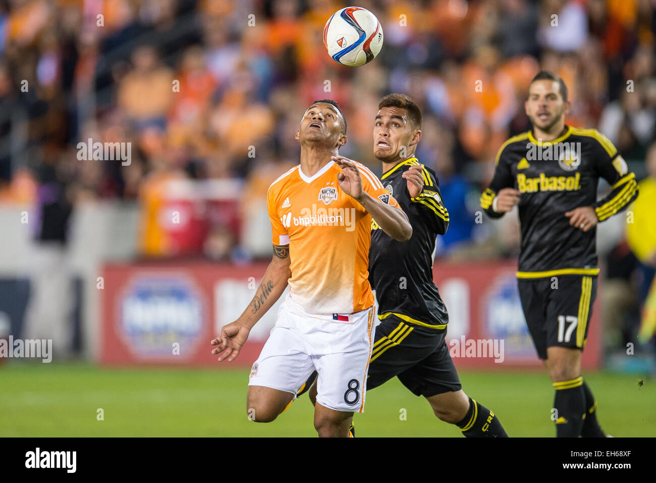Houston, Texas, USA. 7th Mar, 2015. Houston Dynamo midfielder Luis Garrido (8) looks to make a header during an MLS game between the Houston Dynamo and the Columbus Crew at BBVA Compass Stadium in Houston, TX on March 7th, 2015. The Dynamo won 1-0. © Trask Smith/ZUMA Wire/Alamy Live News Stock Photo