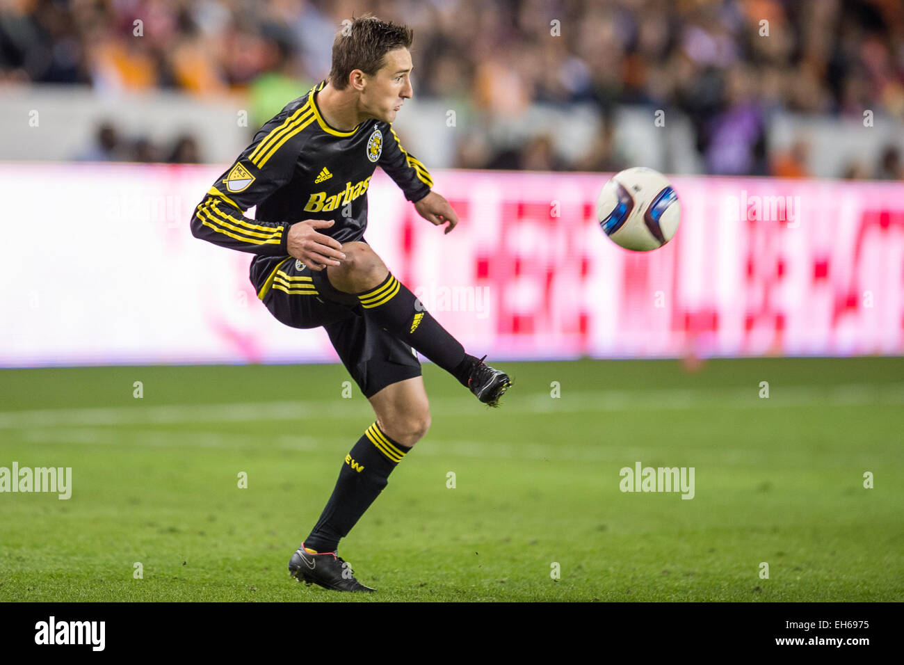 Houston, Texas, USA. 7th Mar, 2015. Columbus Crew midfielder Ethan Finlay (13) controls the ball during an MLS game between the Houston Dynamo and the Columbus Crew at BBVA Compass Stadium in Houston, TX on March 7th, 2015. The Dynamo won 1-0. © Trask Smith/ZUMA Wire/Alamy Live News Stock Photo