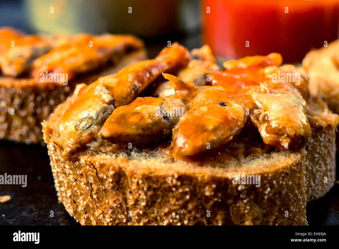 Tapas with canned fish in tomato sauce Stock Photo Alamy