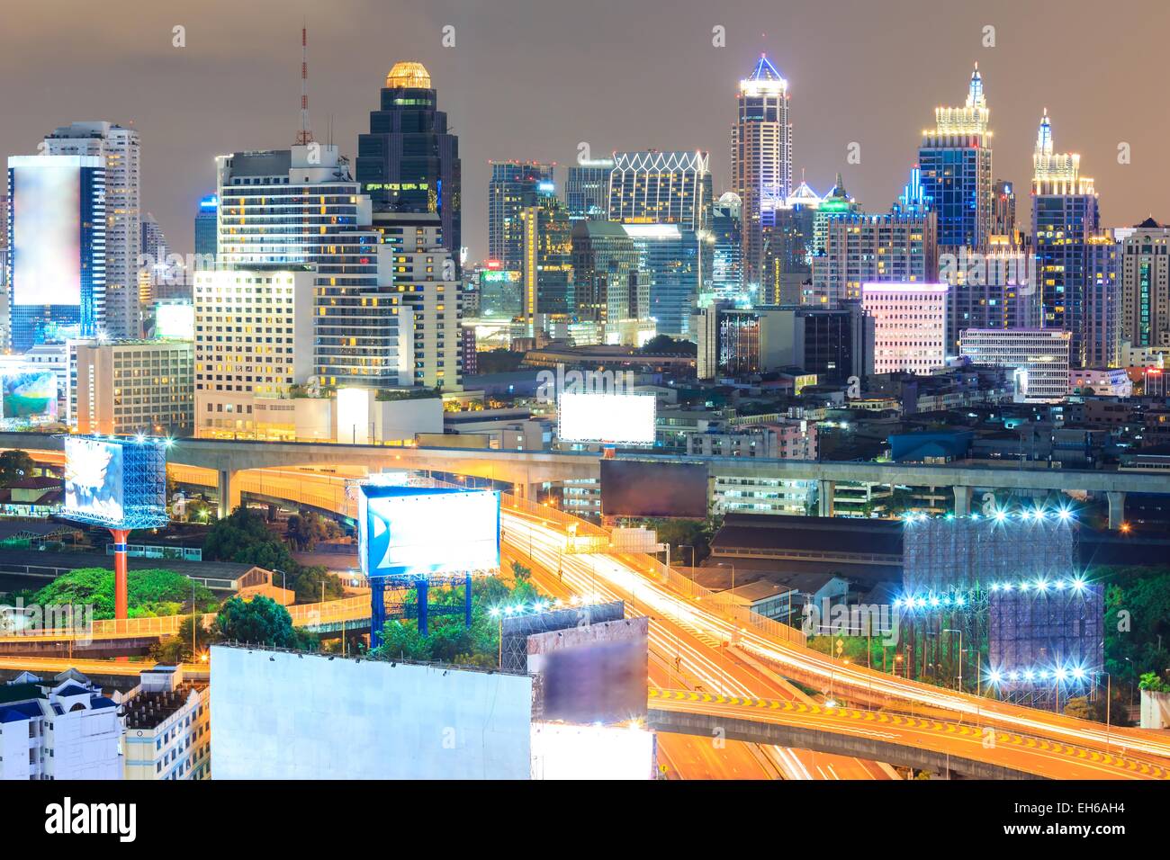 aerial view of Bangkok downtown and highway in business area at Night ...