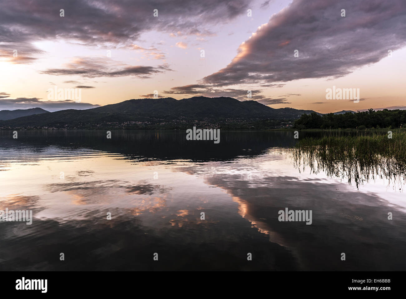 Sunset and clouds over the Varese lake, Lombardy - Italy Stock Photo