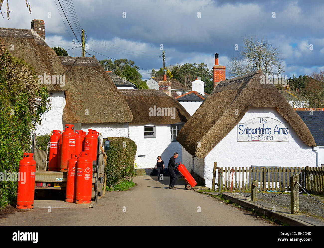 Man delivering Calor gas cannisters to the Shipwright's Arms in the