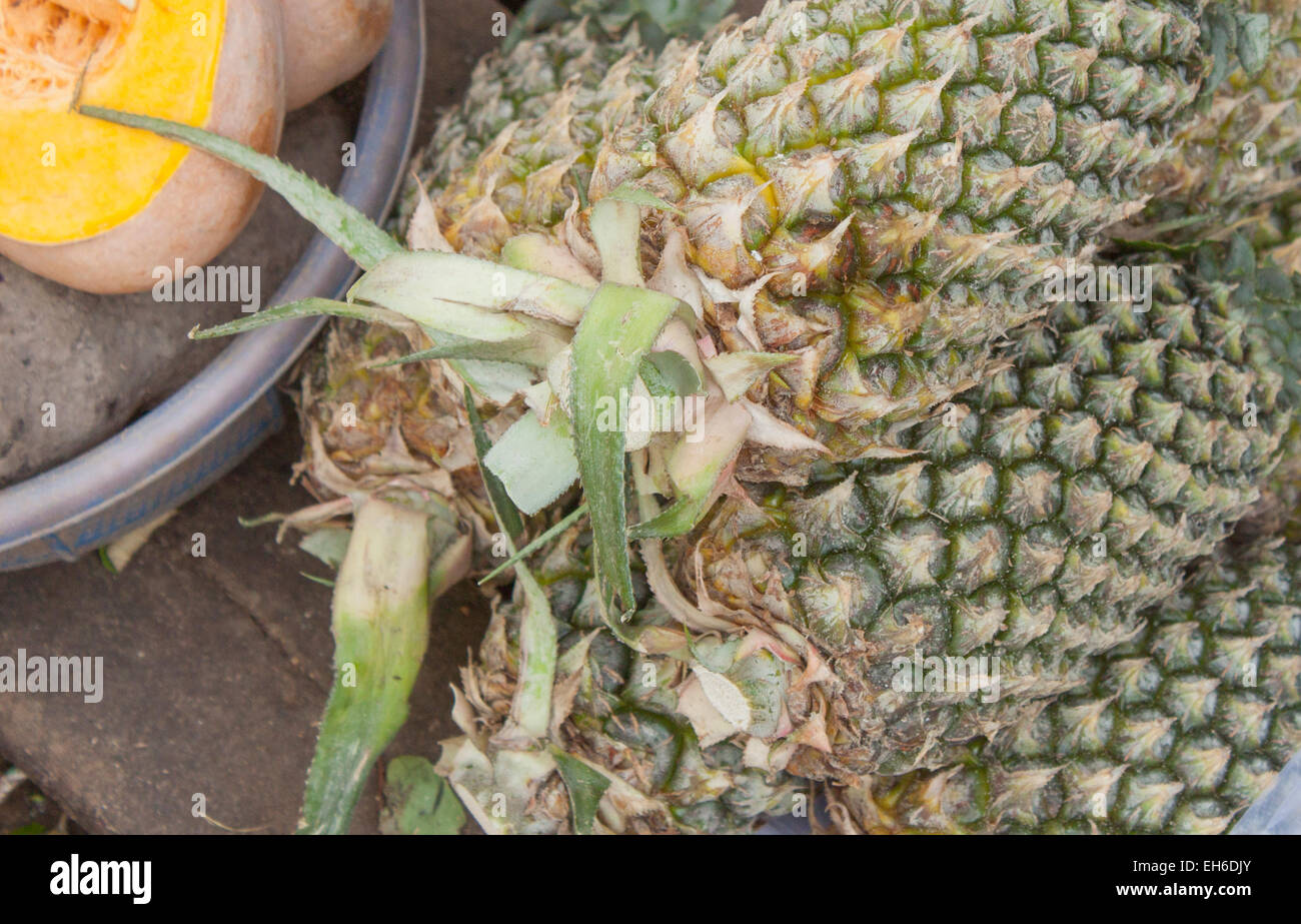 A few fresh pineapples, at a market Stock Photo