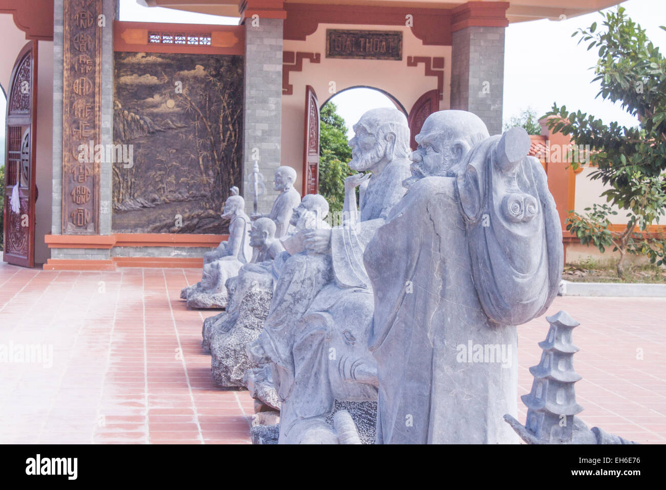 A lot of statues of people, at a temple in vietnam Stock Photo