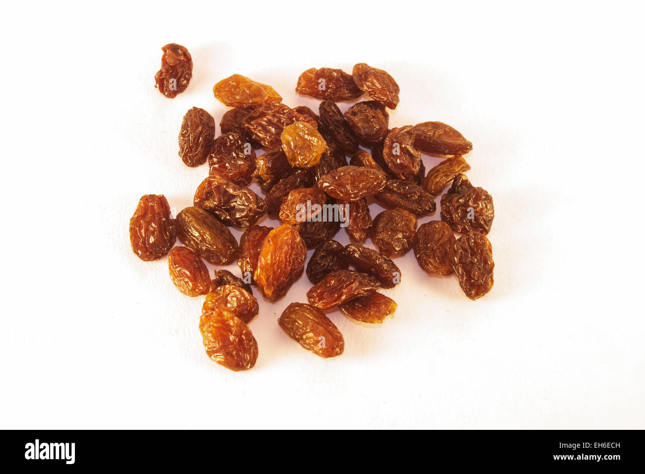 A lot of raisin, isolated on white background Stock Photo - Alamy