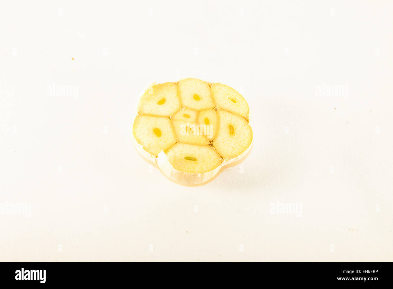 Half garlic bulb, isolated on white background Stock Photo Alamy