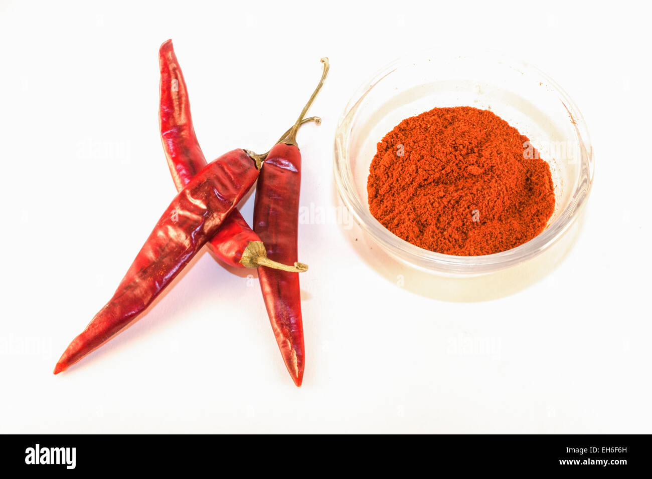 Red chili and chili powder, isolated on white background Stock Photo